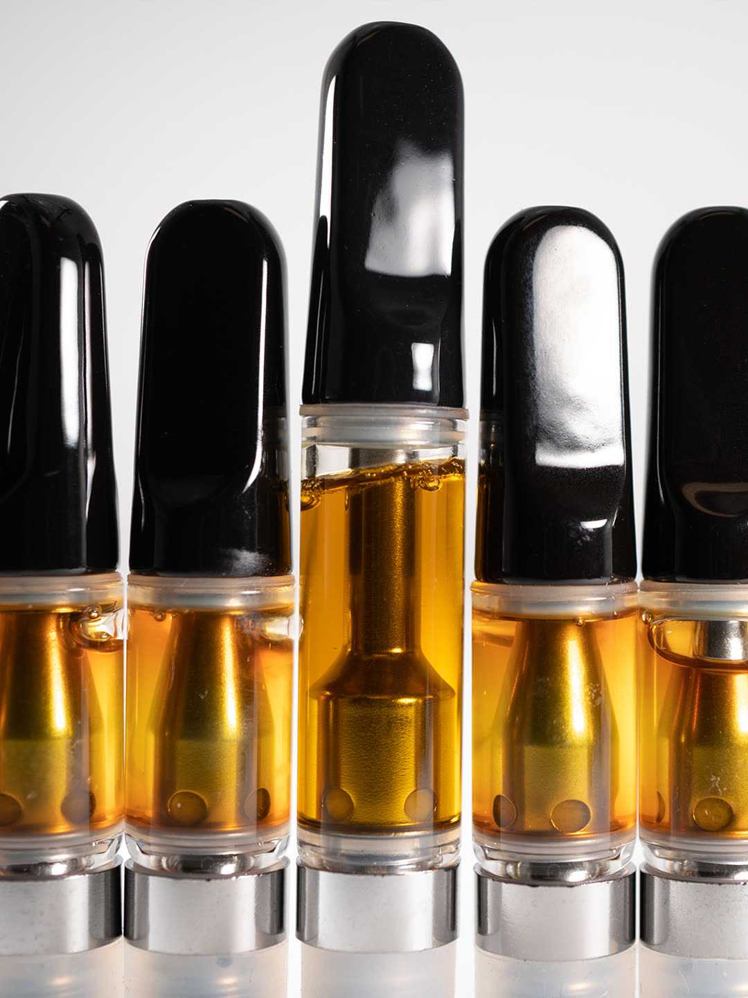 Olio one gram live rosin cartridges lined up